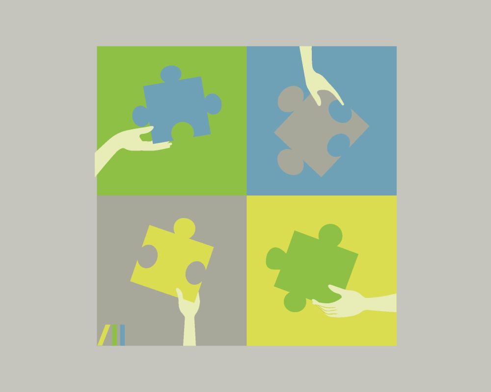 Zdjęcie przedsyawia cztery kwadraty, na których widnieją części puzzli podtrzymywane przez rękę niewidocznej na ilustracji osoby. 