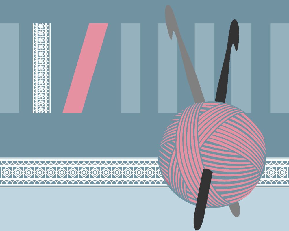 Włóczka z wbitymi w nią dwoma szydełkami.