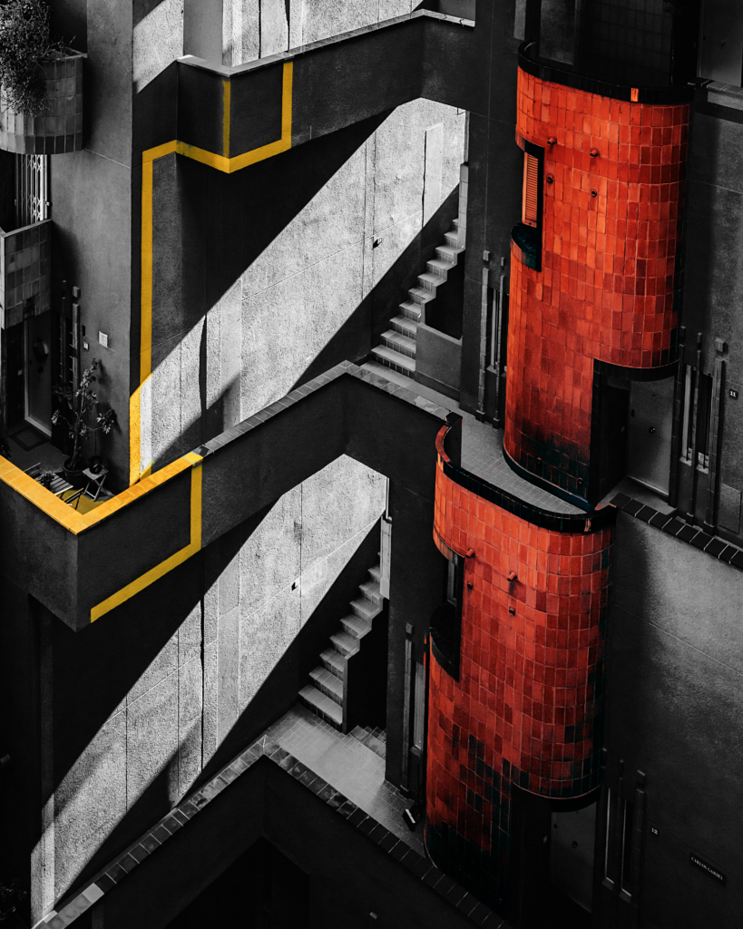 Grafika prezentująca miejską architekturę w zimnych kolorach