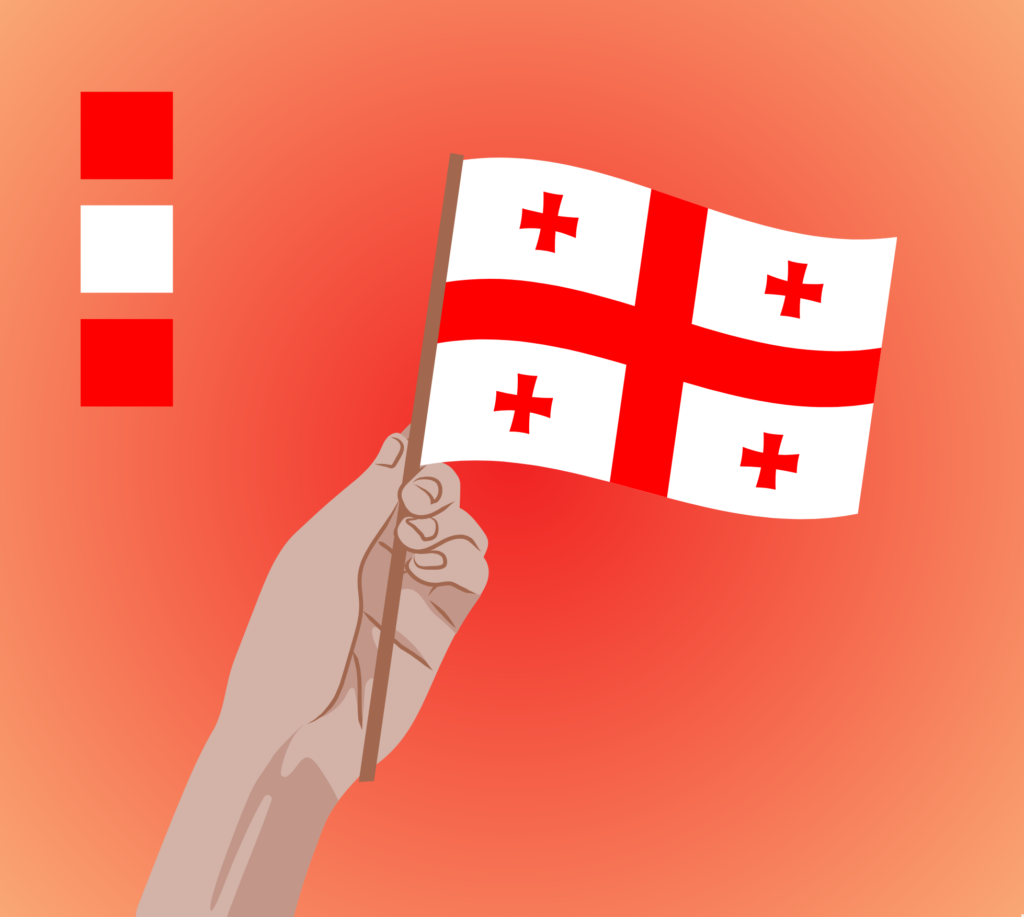 Ilsutracja. Dłoń trzymająca flagę Gruzji.